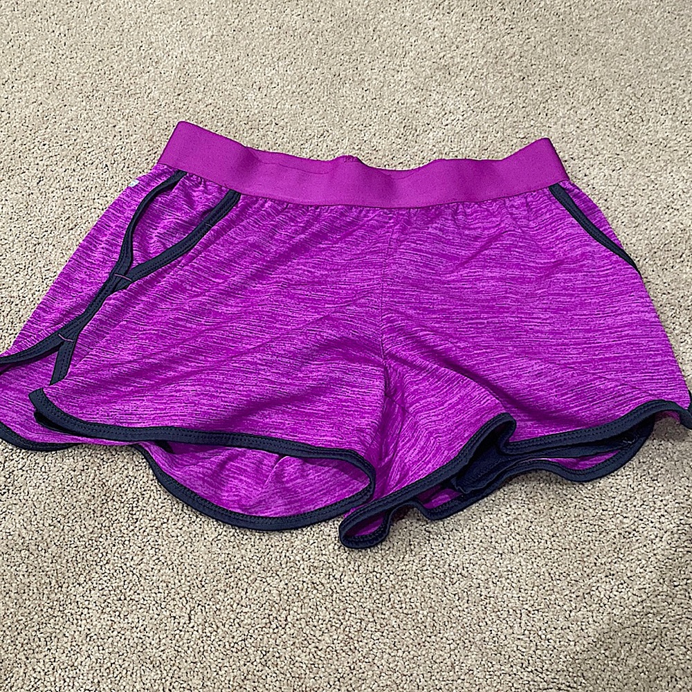 This pair of shorts has biker shorts underneath and is breathable